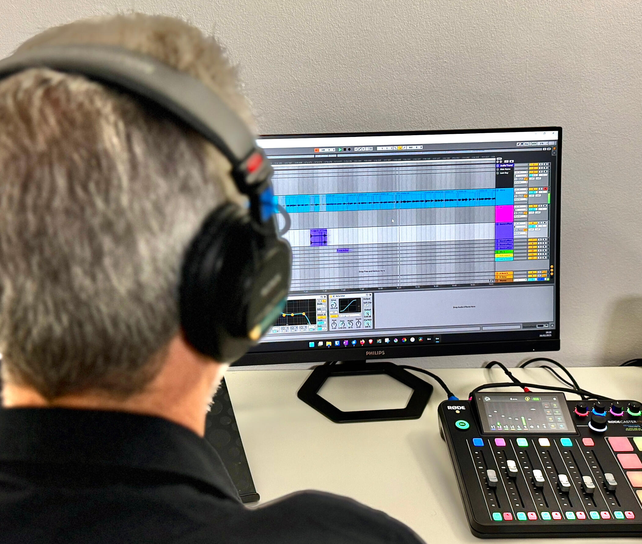 Image of sound engineer editing a podcast